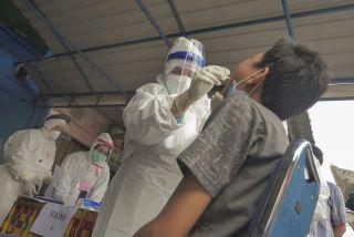 Gugus Tugas Covid-19 Tes Swab Massal di Pasar Agus Salim Pekanbaru