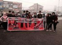 Puluhan Sapma Pemuda Pancasila Bagi Masker di Jalanan Pekanbaru