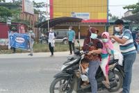 Asap masih Pekat, DPC GAMKI Kampar sebar 4.000 Masker