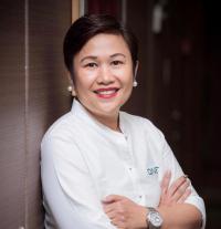 Mengenal Malou Caluza, CEO Pertama QNet Sponsor Manchester City 
