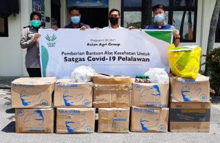 Tekan Penyebaran Covid-19, Asian Agri Salurkan Bantuan APD dan Vitamin untuk Warga Pelalawan