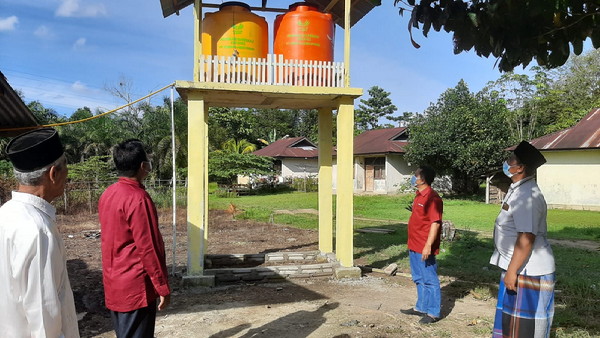 Asian Agri   Bangun Fasilitas Sarana Air Bersih Rumah Ibadah