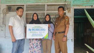 Ahli Waris Kepala Desa Subarak, Kampar Terima Santunan Rp90 Juta dari BPJamsostekÂ 