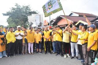 Pj Bupati Kampar Lepas Gerak Jalan Santai HUT Golkar ke-58