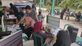 Ratusan KK Penduduk Bukit Abas Mendapat Layanan Kependudukan dari Pemkab Bengkalis