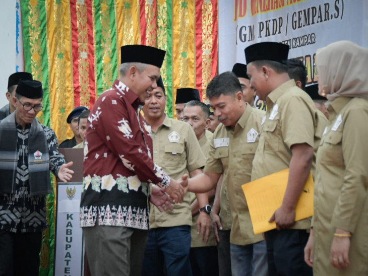 Puncak Peringatan Hakordia Tahun 2022, Pj Bupati Kampar Tandatangani Komitmen Bersama