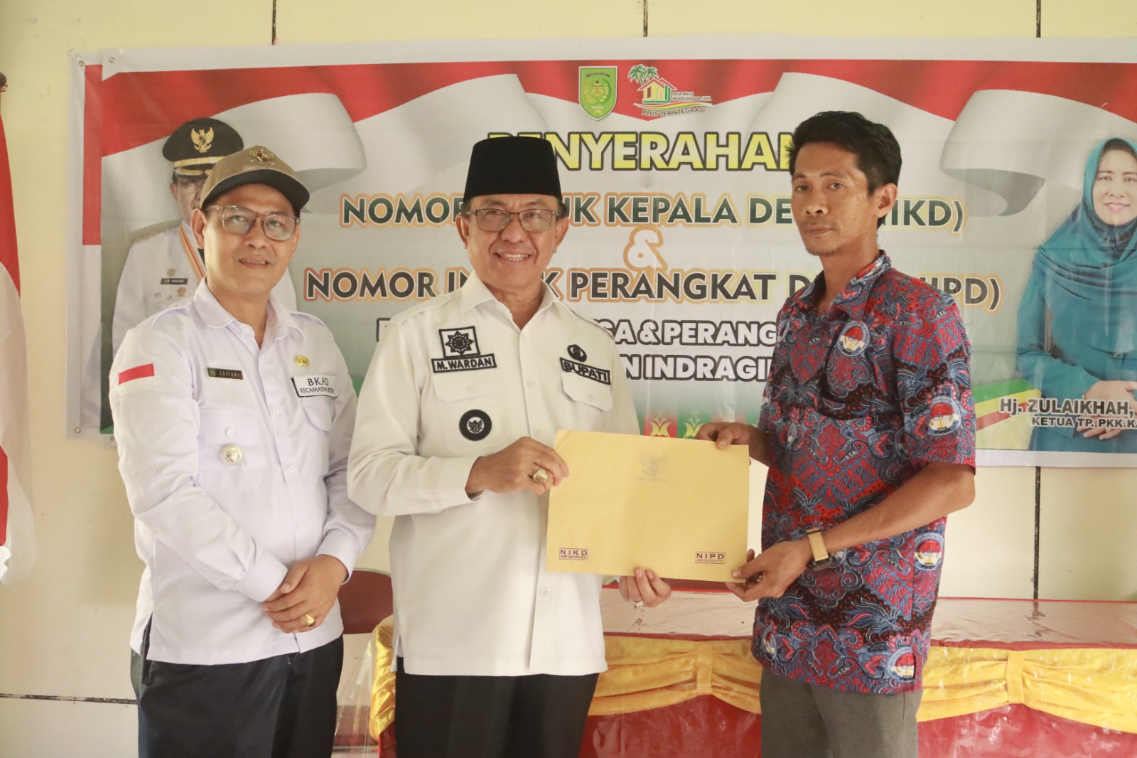 Bupati Serahkan NIKD dan NIPD Kelapa Desa dan Perangkat Desa se Kecamatan Reteh