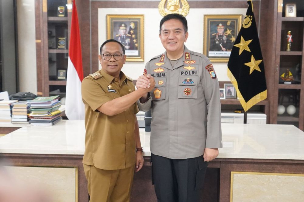 Pj Gubri Berkunjung ke Polda Riau