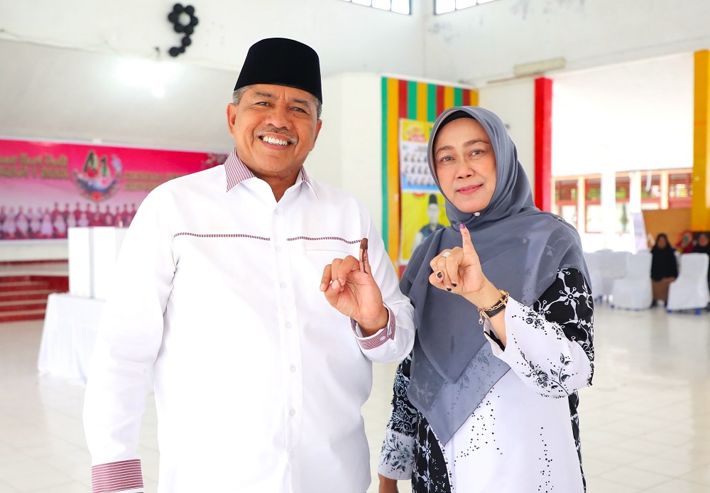 Usai Gunakan Hak Pilih, Bupati Alfedri Harap Partisipasi Pemilih Meningkat