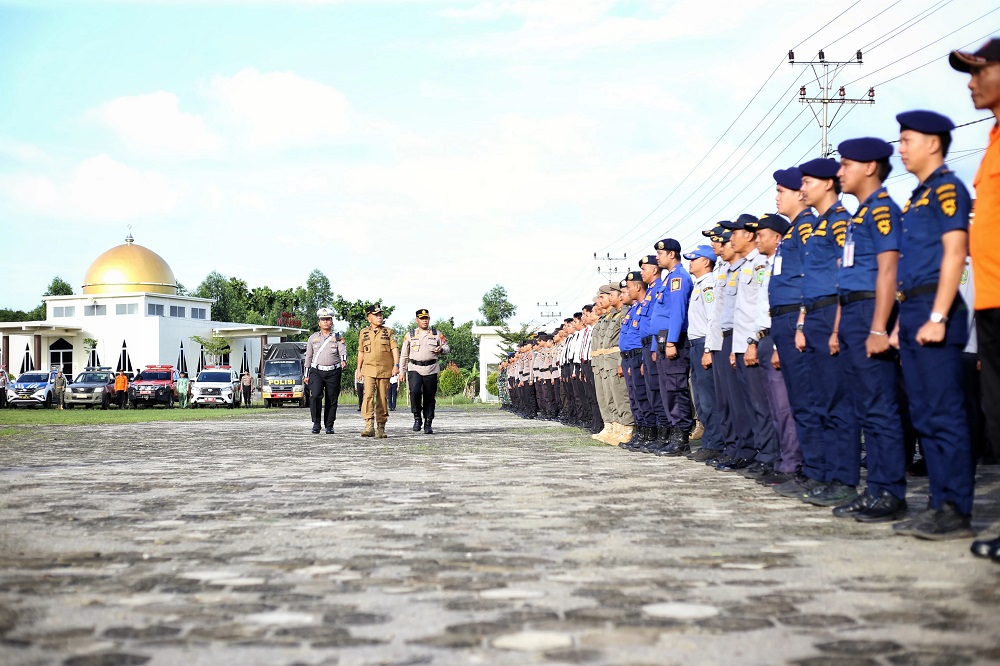 Bupati Asmar Pimpin Apel Gelar Pasukan Operasi Lilin Lancang Kuning Tahun 2024