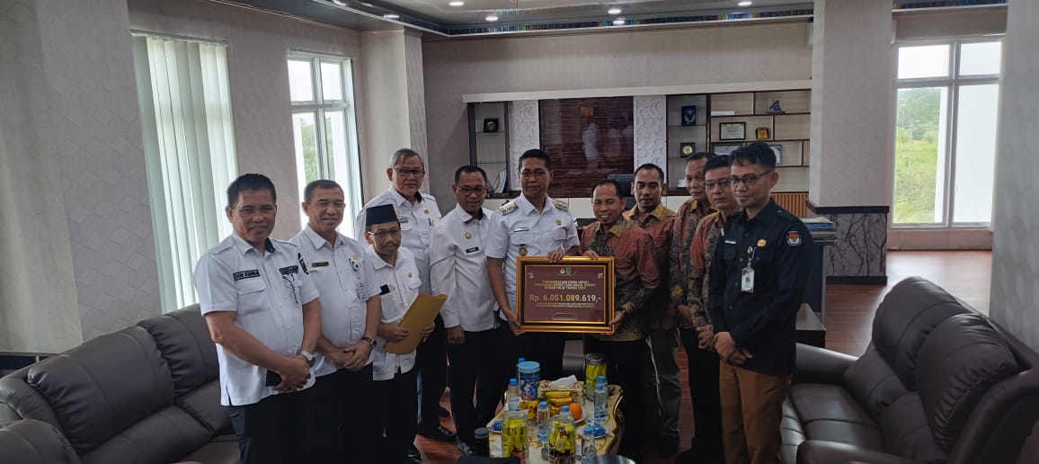KPUD Rohil Kembalikan Sisa Dana Hibah Pilkada Rp 6,051 Miliar