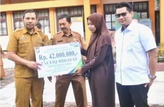 Pemkab Kampar Serahkan Santunan BPJS Ketenagakerjaan, Negara Hadir Lindungi ASN dan PPPK