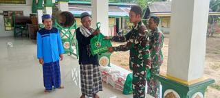 Jumat Berkah, Satgas TMMD Ke 125 Kodim 0321 Rohil Bagikan Sembako 