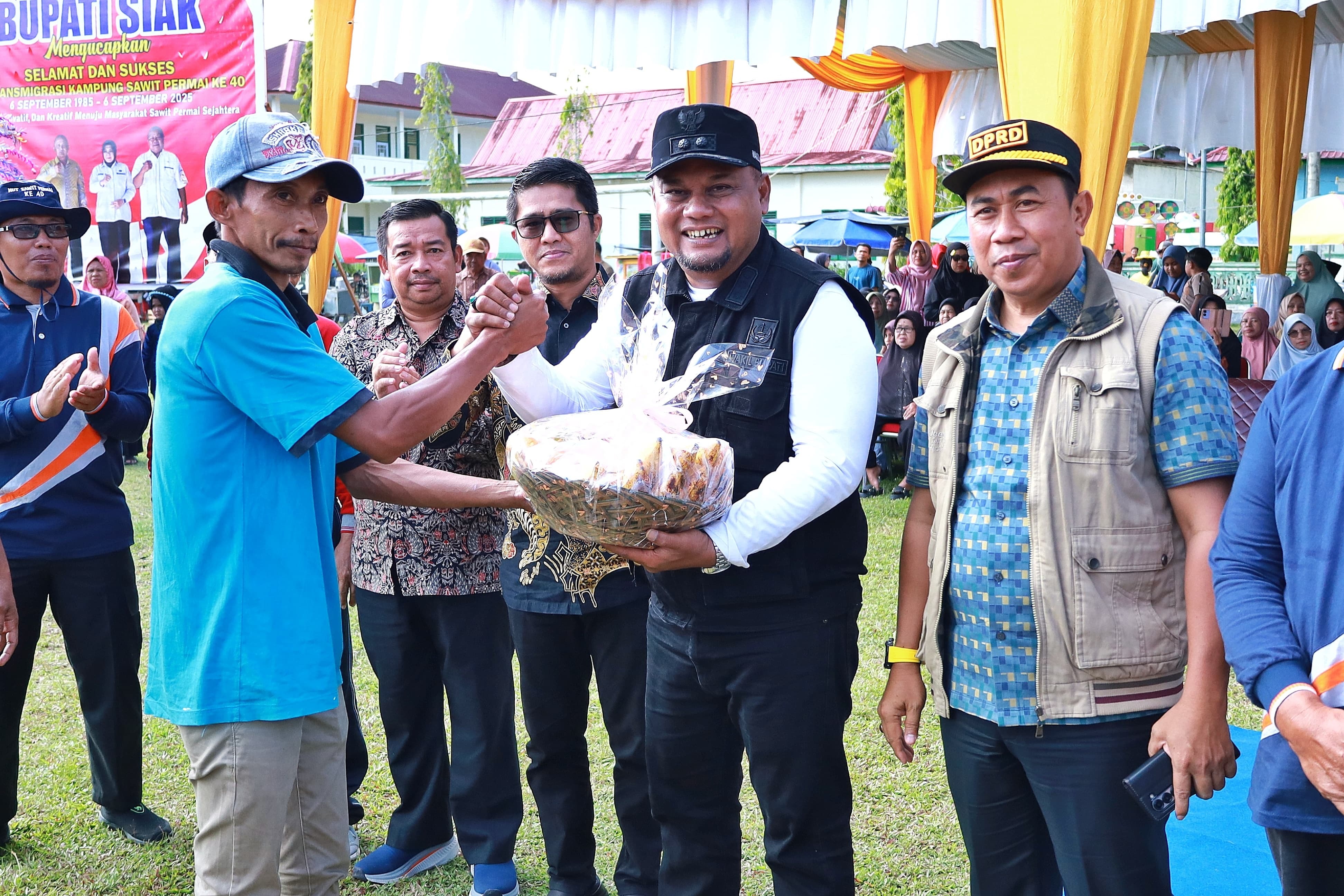 Dihadiri Wabup Siak, Warga Kampung Sawit Permai Peringati 40 Tahun Hari Transmigrasi