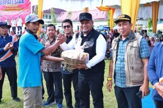 Dihadiri Wabup Siak, Warga Kampung Sawit Permai Peringati 40 Tahun Hari Transmigrasi