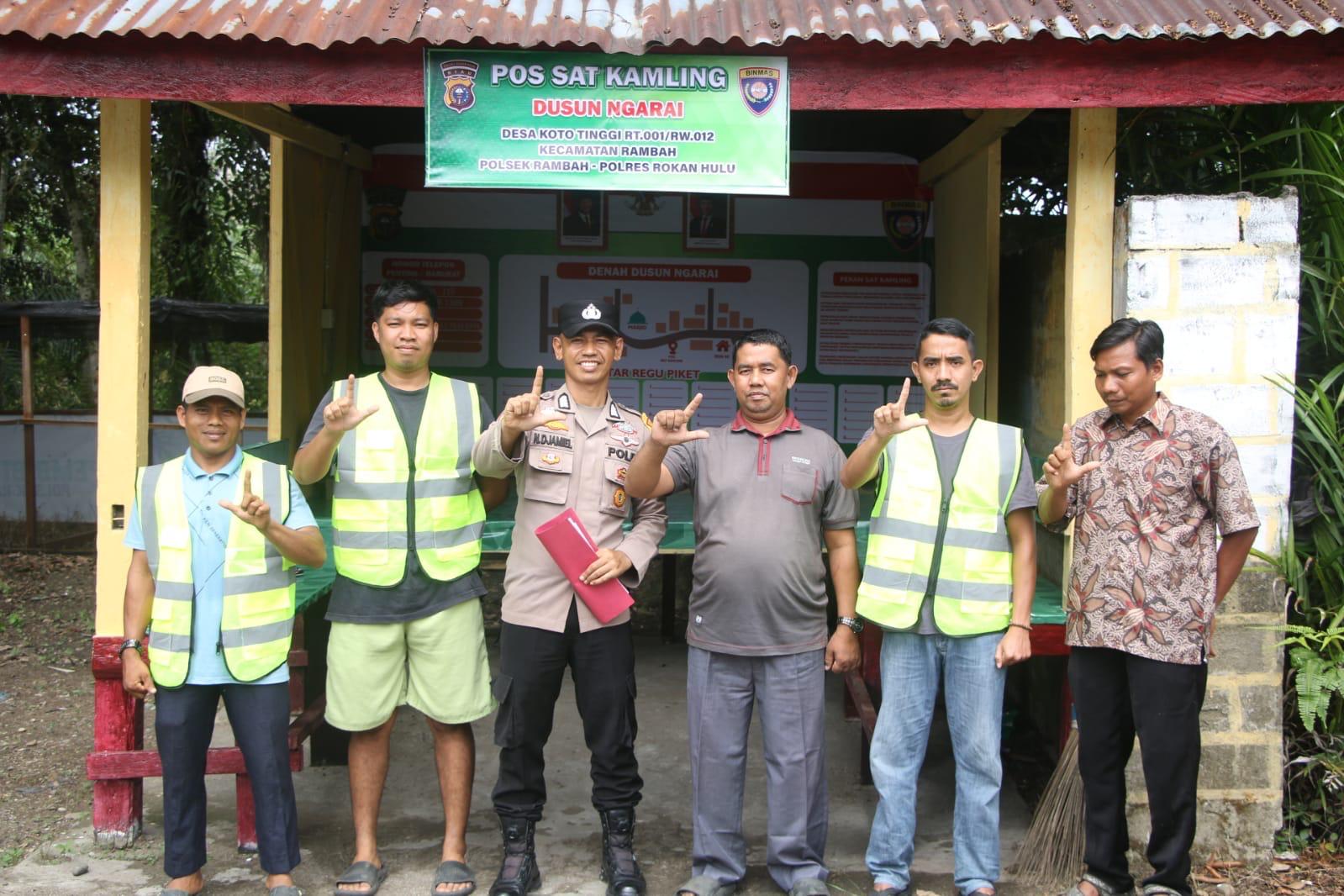 Bupati Anton Ajak Seluruh Desa di Rohul Contoh Bhabinkamtibmas Koto Tinggi dalam Penguatan Satkamlin