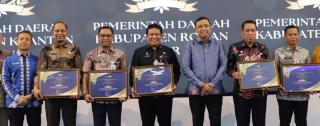 Pemkab Kuansing Raih Dua Penghargaan Bergengsi dari Kanwil DJP Riau