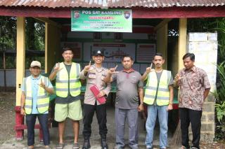 Bupati Anton Ajak Seluruh Desa di Rohul Contoh Bhabinkamtibmas Koto Tinggi dalam Penguatan Satkamlin