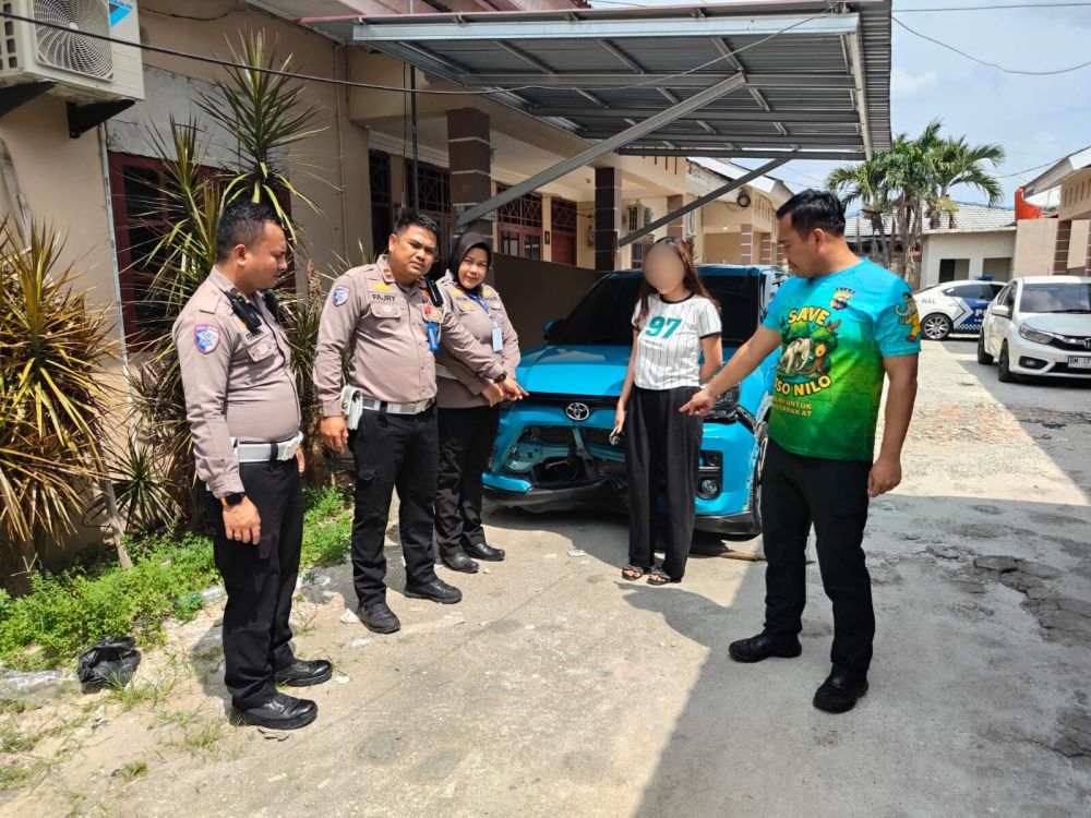 Pakai Ponsel Saat Berkendara, Pengemudi Penabrak Petugas Marka Jalan di Pekanbaru Ditangkap Polisi