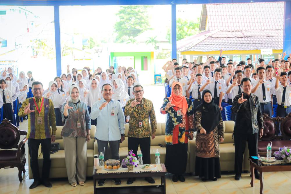 Pemko Dumai dan OJK Riau Edukasi 250 Pelajar SMPN 2 Tanamkan Literasi Keuangan
