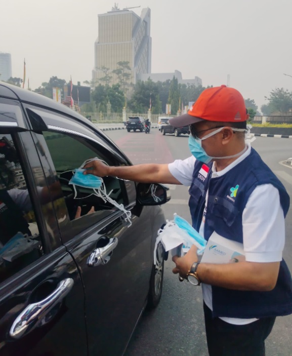 Kabut Asap Pekanbaru, Diskes Bagikan 2.000 Masker Gratis kepada Pengendara